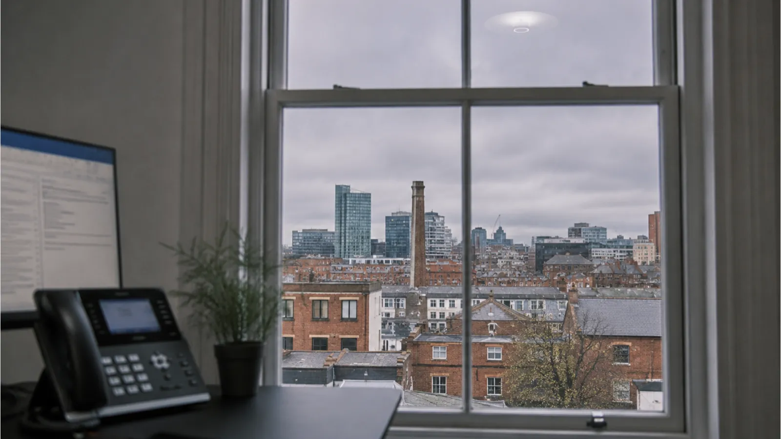 IT support Belfast - office view with Belfast cityscape